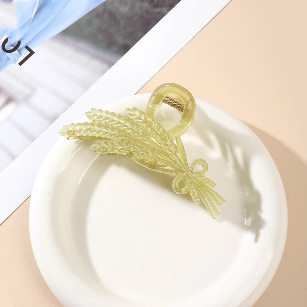 Clip à cheveux jaune design nœud
